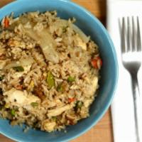 Kow Pad Fried Rice · Thai style fried-rice with onions, diced peas, carrots and egg.