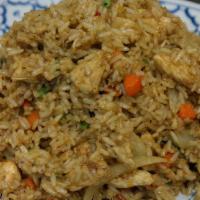 Pung Ka Ree Fried Rice · Fried-rice with onions, diced peas, carrots and yellow curry powder.
