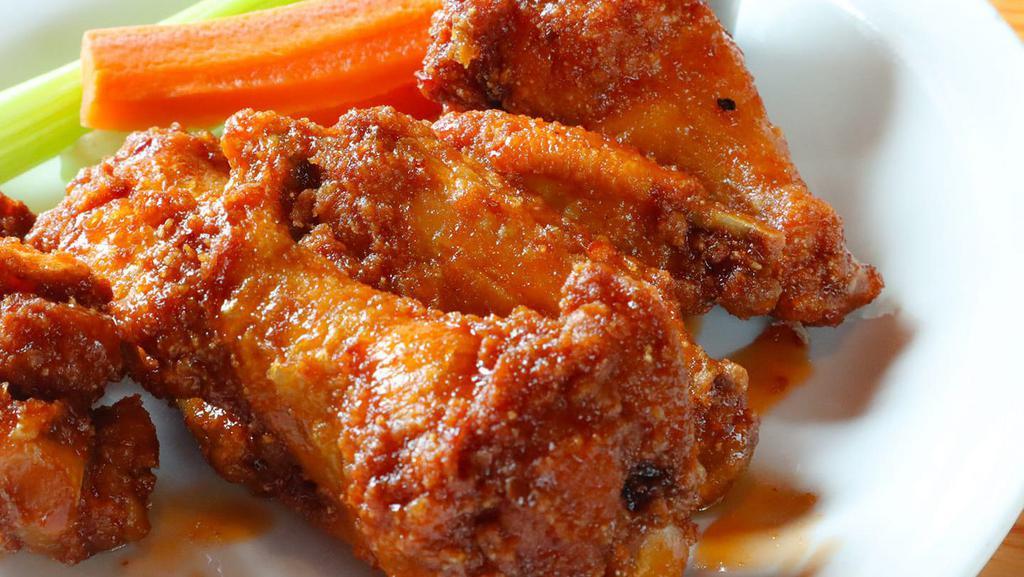 Chicken Wings 6 · Wings fried then tossed in sauce choice, teriyaki, bbq, honey bbq or buffalo. Served with ranch or blue cheese.