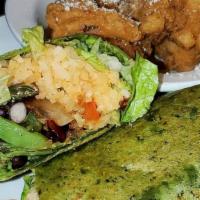 Verde Burrito · Spinach flour tortilla stuffed with sautéed bell peppers,  black bean corn salsa, rice, lett...