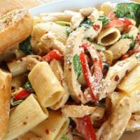 Diablo Pasta · Chicken sautéed with mushrooms, pepper flakes, roasted red peppers, spinach, and rigatoni pa...