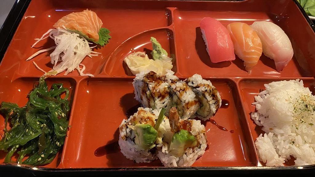 Bento C · Sushi rice, three tuna sashimi, tuna sushi, salmon sushi, white fish sushi, shrimp tempura roll.