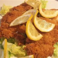 Lemon Chicken · Boneless crispy chicken breast with fresh lettuces, special lemon sauce on the side.