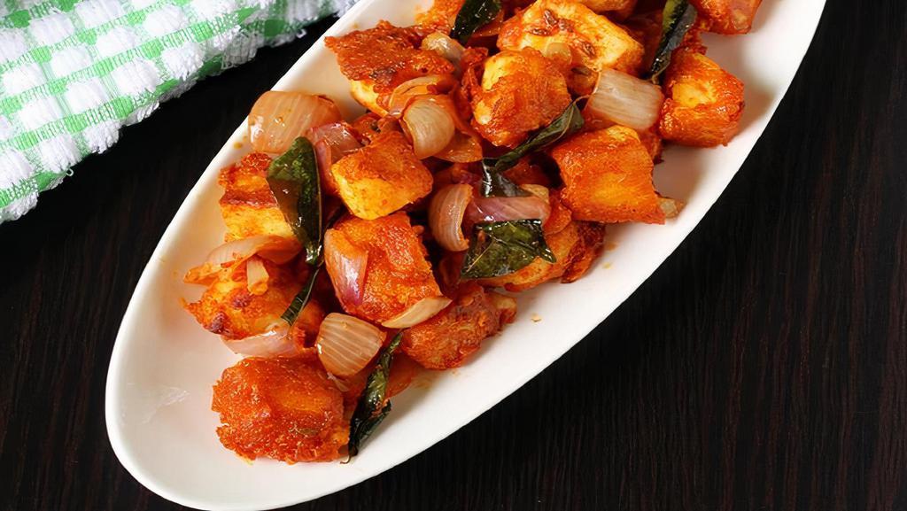 Paneer 65 · Bite size Paneer pieces marinated
seared in special 65 sauce