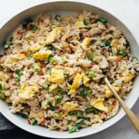 Egg Fried Rice · Egg Fried rice is a dish of cooked rice that has been stir-fried in a wok or a frying pan wi...