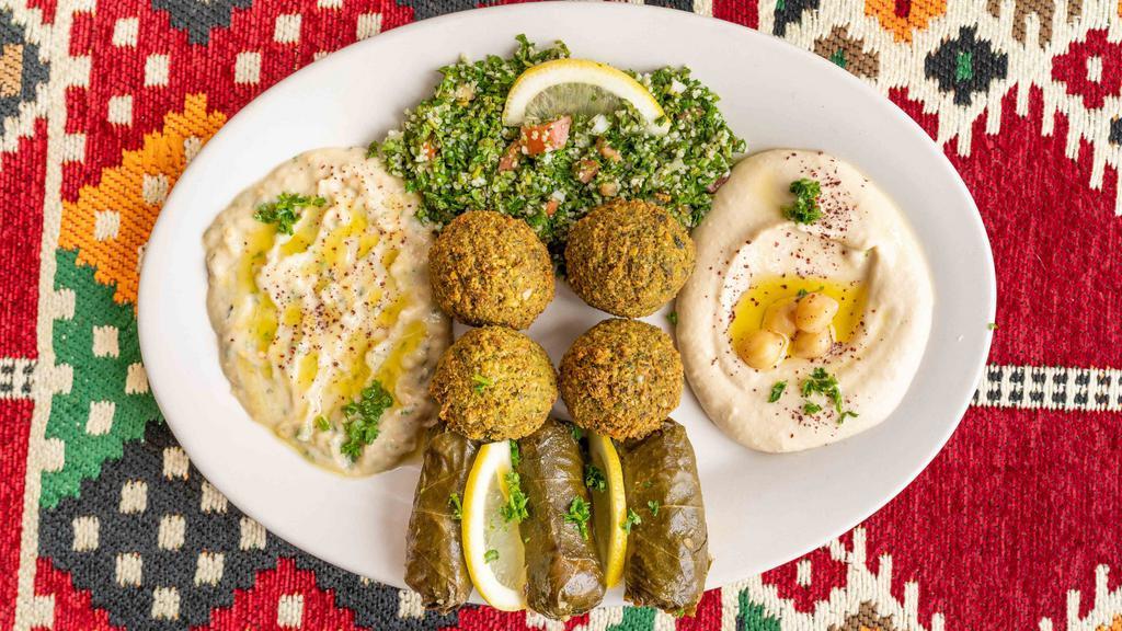 Falafel Platter · Includes hummus and side of Jerusalem salad. Served with rice, grilled onion, pepper, tomato and pita.