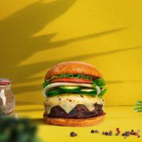 Give Me A Peno Burger · Crispy vegan falafel patty topped with tahini, jalapenos, lettuce, tomato, onion, and pickle...