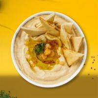 Hummus Me Plate · A mixture of mashed garbanzo beans, lemon juice and tahini, and garlic served with pita bread.