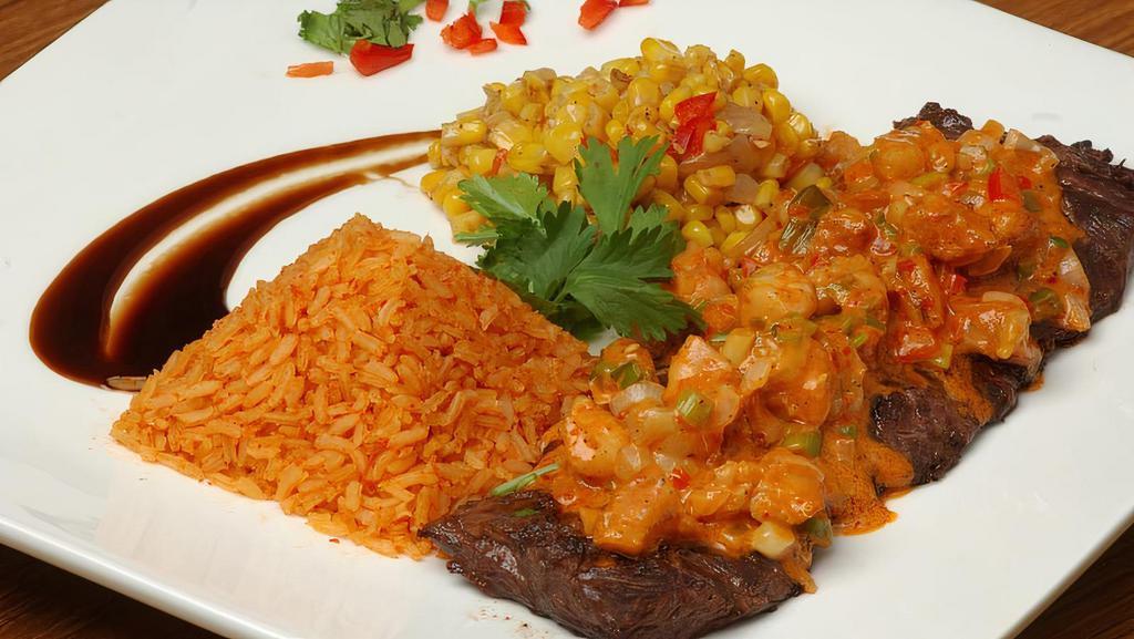 Carne Asada Suiza · 10 oz. marinated skirt steak grilled to perfection topped with cheese, sour cream and your choice of salsa. Served with Mexican rice and re-fried pinto beans.