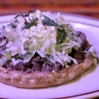 Sopes · Your choice of filling and beans. lettuce tomato cheese green sauce and sour cream on the top.