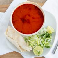 Pozole · Our traditional Morelos style hominy soup with pork. Includes two Mexican tostadas.