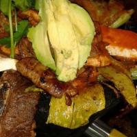 De Carnes · A delicious mix of steak, carnitas, chorizo, and chicken. Mexican cheese on top with our hom...