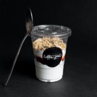 Granola Parfait · Plain yogurt with organic strawberry jam, sweet and crumbly granola, and berries