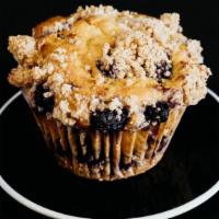 Blueberry Muffin · Moist and chewy muffin loaded with fresh blueberries and topped with a sweet crumble