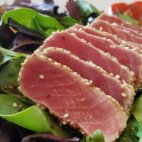 Seared Tuna Salad · Seared tuna, sesame seeds, spring mix, and Goma sauce.