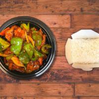 Green Pepper Beef With Onions · Beef, green peppers, white onions, and carrots.