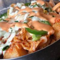 Kimchi Tots · Tater Tots, Kimchi, Scallions, Jalapeno, Cilantro Aioli, Sambal Aioli