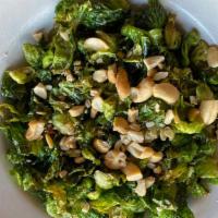 Vietnamese Brussel Sprouts · Brussel Petals Tossed in A Sweet Chili Sauce, Cashews