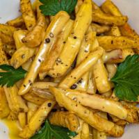 Cheese Fries · Crispy french fries, tossed in kosher salt and cracked black pepper, topped with our creamy ...