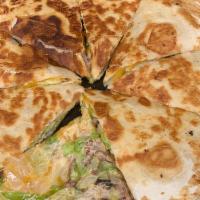 Quesadilla · Flour tortilla stuffed with Colby jack cheese, jalapeños, and scallions. Served with salsa a...