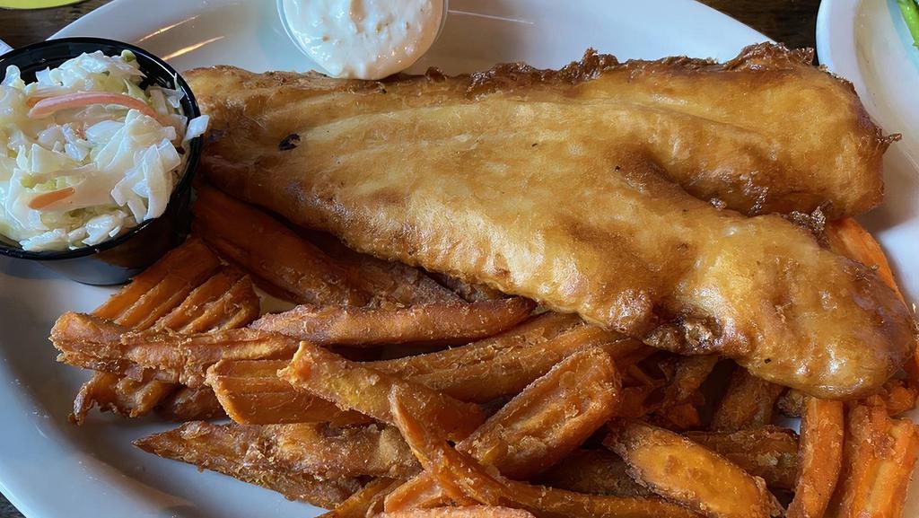 Fish & Chips · British style Atlantic cod beer battered and served with steak fries, coleslaw and house made tartar sauce.