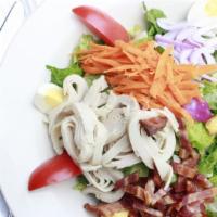 Chef Salad · Chopped romaine, turkey, bacon, hard boiled egg, cheddar cheese, tomato, red onion, carrots,...