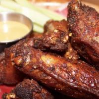 Dry Rub Wings · made with house seasoning, served with jalapeno ranch and celery