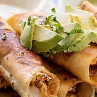 Flautas · Deep-fried rolled tortilla filled with chicken. Topped with lettuce, pico de gallo, sour cre...
