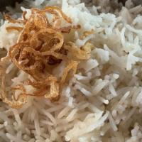 R-6. Coconut Rice · Aromatic basmati rice cooked in mustard seeds, curry leaves, coconut, and ginger.