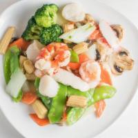 Seafood Delight · Scallop, crabmeat and jumbo shrimp with baby corn, water chestnuts, broccoli, straw mushroom...