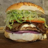 Gyro Burger · With gyro meat, lettuce, tomato, onions, tzatziki.