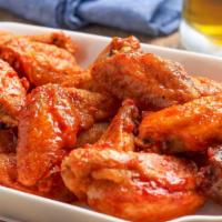 Chicken Wings · well marinated crumbs coated deep fried wings with different choices of sauces