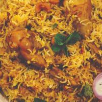 Chicken Biryani · Freshly Cooked Chicken Leg Quarter with delicious spices and basmati rice ethnic Pakistani S...