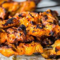Chicken Tikka · Grilled Chicken breast cubes marinated with selected spices for best taste and aroma served ...