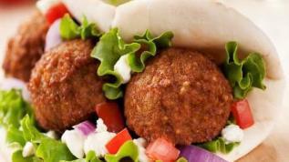 Falafel Rice · served with rice and salad