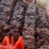 Shish Kebab · served with rice and salad