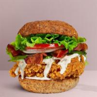 Fried Chicken Bacon Sandwich · Buttermik fried chicken, crispy bacon, cheddar cheese, chipotle aioli, caramelized onions, t...