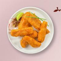 Buffalo Chicken Tenders · Chicken tenders breaded and fried until golden brown, tossed in buffalo sauce. . Served with...