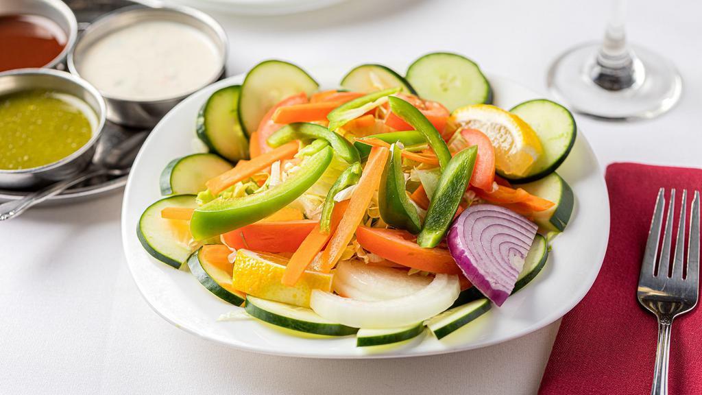 House  Salad · Fresh cucumbers, carrots, onions, and lettuce leman etc served with house dressing