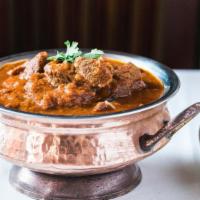 Lamb Curry Dinner · Lamb Curry, Basmati Rice, Tandoori Naan.