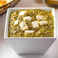 Palak Paneer · Fresh spinach cooked with cottage cheese delicately spiced