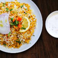 Mixed Vegetables Biryani · Basmati Saffron rice cooked with mixed vegetables in a mild spice