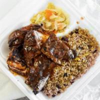 Small Jerk Chicken · Including red beans and rice with cabbage and plantains.