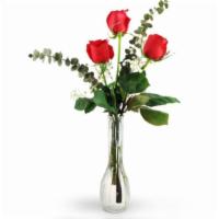 Red Roses In A Bud Vase (3) · Vase of three roses with baby's breath with greens.