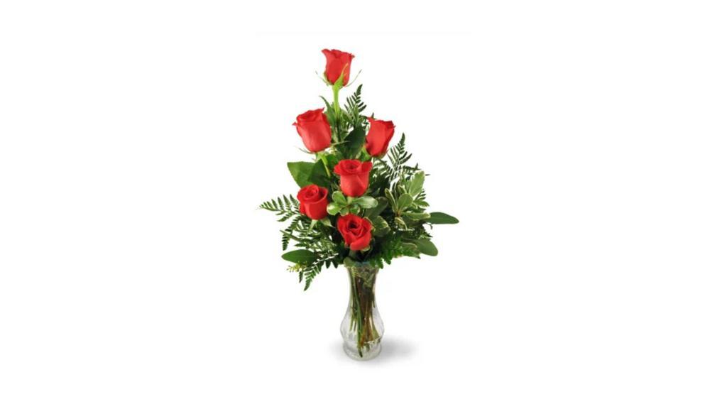 Red Roses In A Vase (6) · Vase of six roses with babies breath and mixed greens.