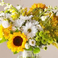 Hello Sunshine · Garden mix of seasonal flowers in a vase