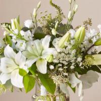 Ftd Alluring Elegance Bouquet · Garden style vase of flowers.