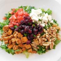 The Cranberry Chicken · Grilled chicken, tomatoes, feta cheese, romaine lettuce or spinach, dried cranberries, candi...