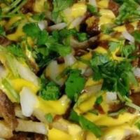 Jerk Fries · Nacho cheese, jerk sauce, red onions and cilantro