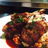 Lamb Chop · Three pieces of lamb chops marinated in yogurt and spices roasted in clay oven.